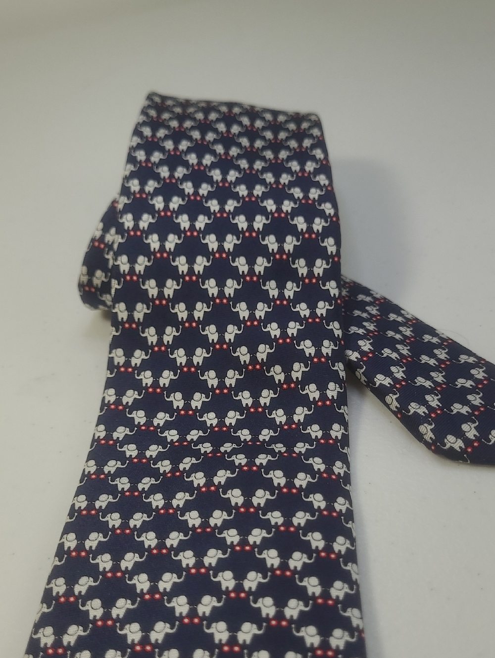 Tailorbyrd Navy Tie with White Elephant and Red Accent Pattern